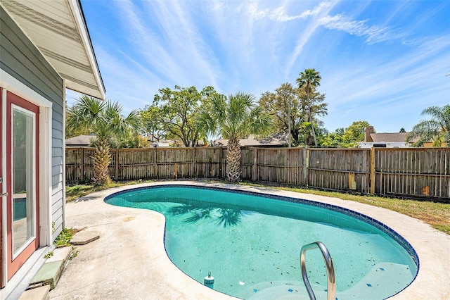 1366 Wexford Dr N, Palm Harbor, FL 34683 - view of pool with a fenced in pool, a patio, and a fenced backyard