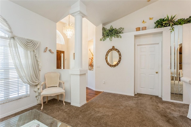 3627 Cypress Meadows Rd, Tampa, FL 33624 - living area featuring a chandelier, ornate columns, baseboards, lofted ceiling, and carpet floors