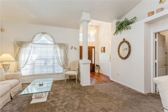 3627 Cypress Meadows Rd, Tampa, FL 33624 - living area featuring carpet, baseboards, a chandelier, and ornate columns