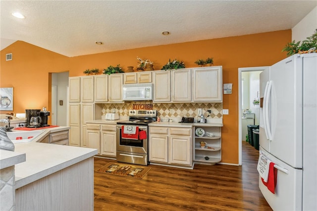 3627 Cypress Meadows Rd, Tampa, FL 33624 - kitchen featuring white appliances, light countertops, a sink, and dark wood-type flooring