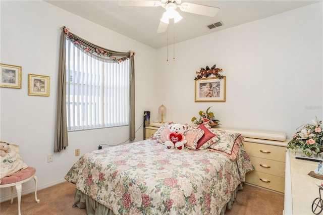 3627 Cypress Meadows Rd, Tampa, FL 33624 - bedroom featuring light colored carpet, visible vents, ceiling fan, and baseboards