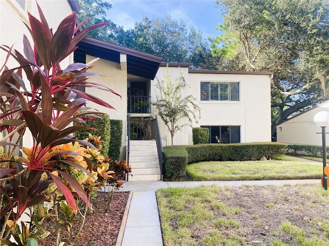 700 Starkey Rd Unit 821, Largo, FL 33771 - view of front of house featuring stucco siding