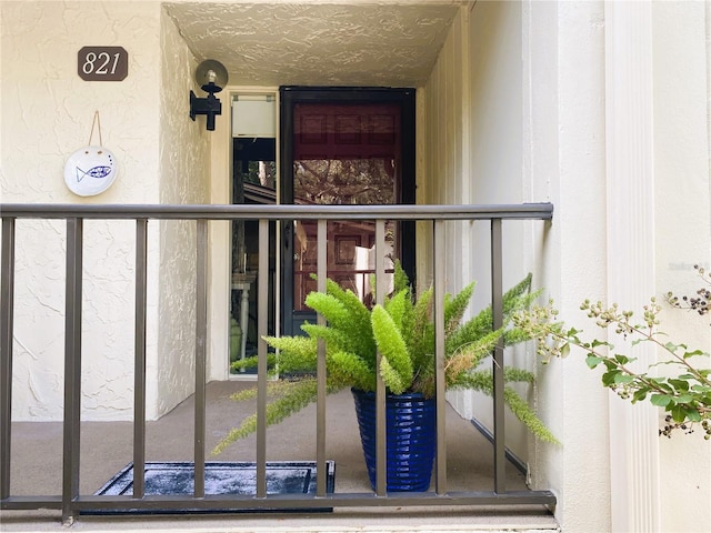 700 Starkey Rd Unit 821, Largo, FL 33771 - doorway to property featuring stucco siding