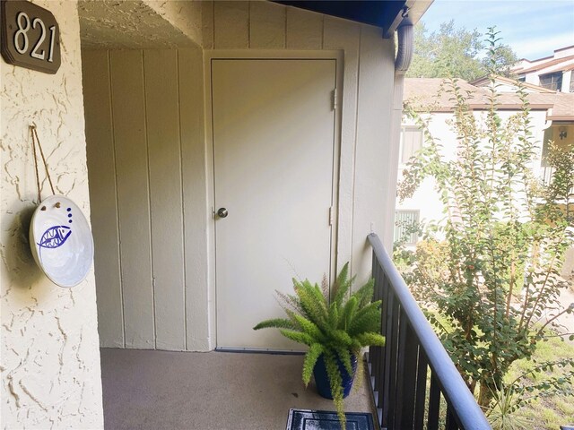 700 Starkey Rd Unit 821, Largo, FL 33771 - doorway to property featuring a balcony