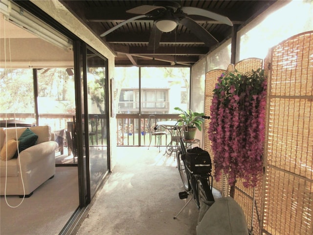 700 Starkey Rd Unit 821, Largo, FL 33771 - exterior space featuring beamed ceiling and a ceiling fan
