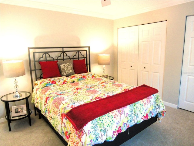 700 Starkey Rd Unit 821, Largo, FL 33771 - carpeted bedroom featuring a closet, baseboards, and crown molding