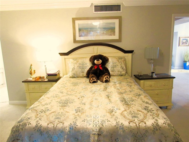 700 Starkey Rd Unit 821, Largo, FL 33771 - bedroom featuring crown molding, carpet, visible vents, and baseboards