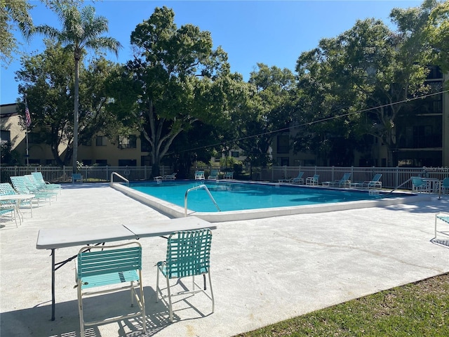 700 Starkey Rd Unit 821, Largo, FL 33771 - pool with a patio and fence