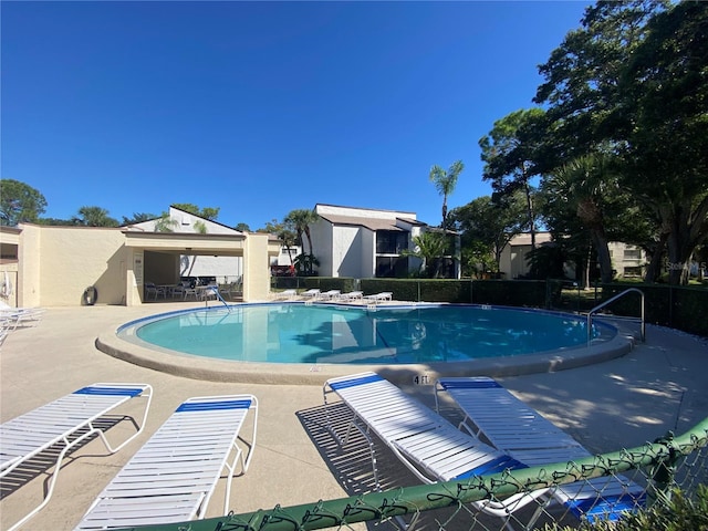 700 Starkey Rd Unit 821, Largo, FL 33771 - pool with a patio and fence