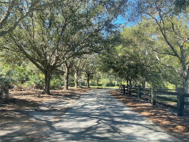 700 Starkey Rd Unit 821, Largo, FL 33771 - view of property's community featuring aphalt driveway and fence