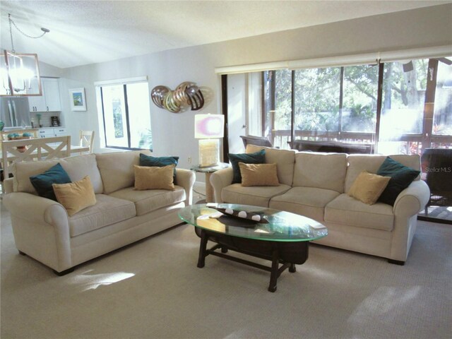 700 Starkey Rd Unit 821, Largo, FL 33771 - living area featuring carpet and a healthy amount of sunlight
