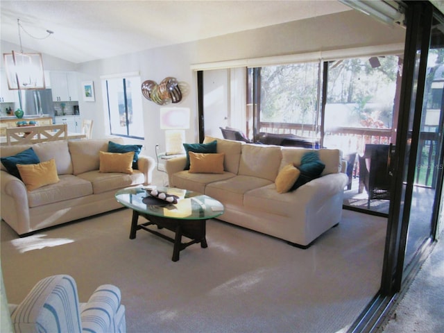 700 Starkey Rd Unit 821, Largo, FL 33771 - living room featuring vaulted ceiling