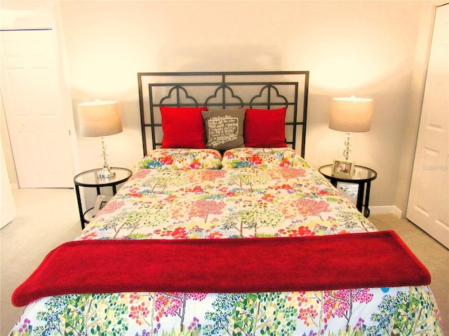 700 Starkey Rd Unit 821, Largo, FL 33771 - bedroom featuring baseboards and carpet floors