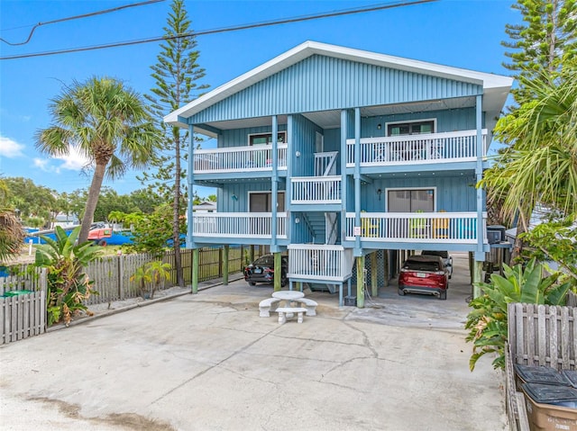 812 Gulf # 3, Indian Rocks Beach, FL 33785 - view of building exterior featuring fence and stairway