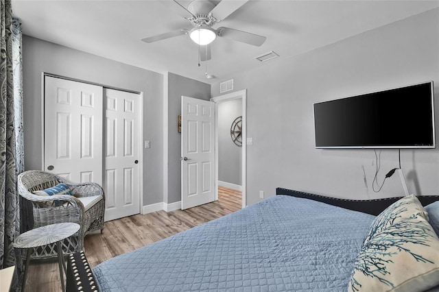 812 Gulf # 3, Indian Rocks Beach, FL 33785 - bedroom with a closet, baseboards, visible vents, and wood finished floors