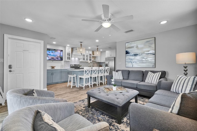 812 Gulf # 3, Indian Rocks Beach, FL 33785 - living area featuring light wood-type flooring, visible vents, ceiling fan, and recessed lighting