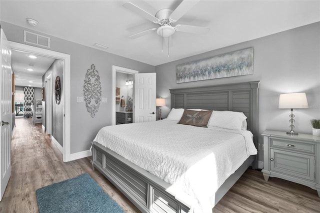 812 Gulf # 3, Indian Rocks Beach, FL 33785 - bedroom featuring baseboards, visible vents, a ceiling fan, and wood finished floors