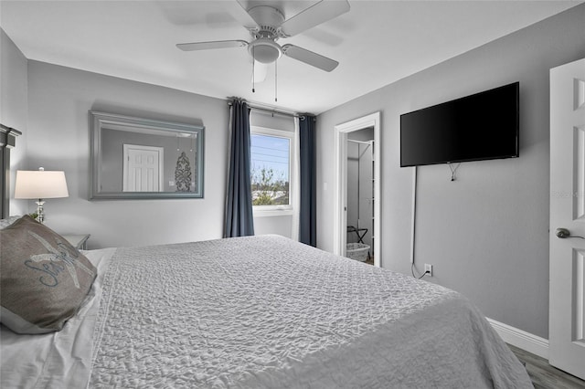 812 Gulf # 3, Indian Rocks Beach, FL 33785 - bedroom with a ceiling fan, baseboards, and wood finished floors