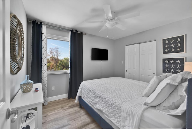 812 Gulf # 3, Indian Rocks Beach, FL 33785 - bedroom featuring baseboards, a closet, light wood finished floors, and ceiling fan