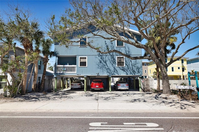 812 Gulf # 3, Indian Rocks Beach, FL 33785 - view of front of house featuring driveway and a carport