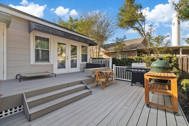 wooden deck featuring french doors and grilling area