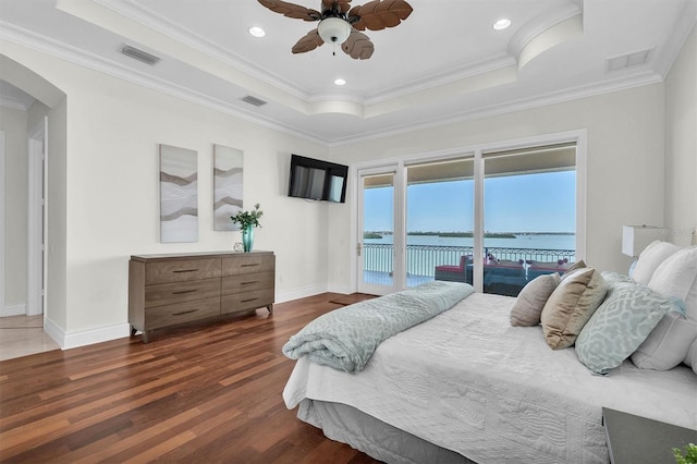 700 126th Ave, Treasure Island, FL 33706 - bedroom featuring a raised ceiling, access to exterior, and visible vents