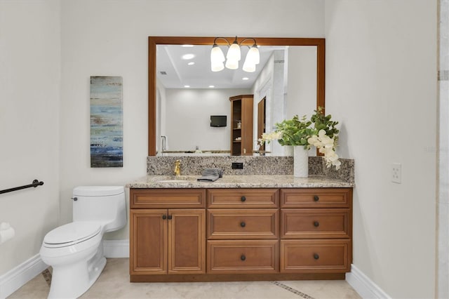 700 126th Ave, Treasure Island, FL 33706 - bathroom featuring tile patterned flooring, vanity, recessed lighting, toilet, and baseboards