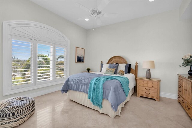 700 126th Ave, Treasure Island, FL 33706 - bedroom with baseboards, light tile patterned floors, recessed lighting, and a ceiling fan
