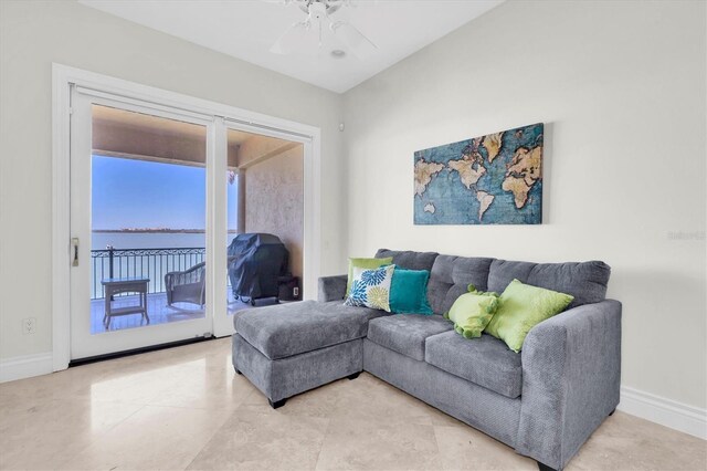 700 126th Ave, Treasure Island, FL 33706 - living room with baseboards and a ceiling fan