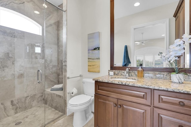 700 126th Ave, Treasure Island, FL 33706 - full bath with a shower stall, toilet, vanity, and a ceiling fan