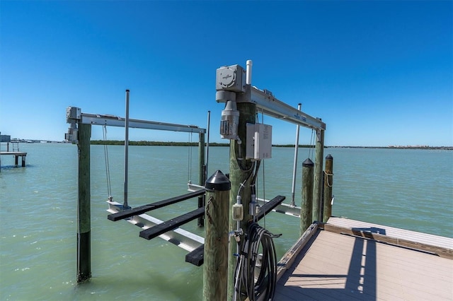 700 126th Ave, Treasure Island, FL 33706 - view of dock with a water view and boat lift