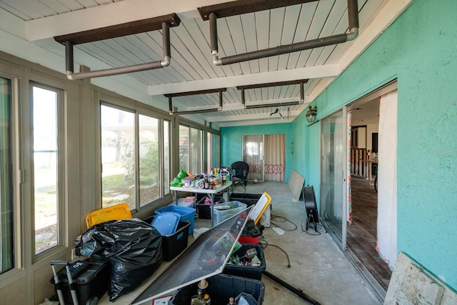1591 N Dakota Ave NE, Saint Petersburg, FL 33703 - sunroom / solarium featuring beam ceiling