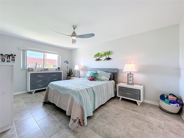 19029 US Highway 19 N Unit 27A, Clearwater, FL 33764 - bedroom featuring ceiling fan and baseboards