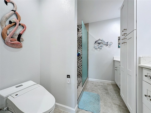 19029 US Highway 19 N Unit 27A, Clearwater, FL 33764 - bathroom with a shower stall, vanity, toilet, and baseboards