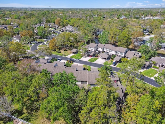 440 Woods Landing Trl, Oldsmar, FL 34677 - birds eye view of property featuring a residential view and a wooded view