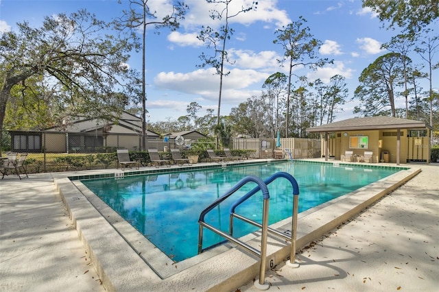 440 Woods Landing Trl, Oldsmar, FL 34677 - pool featuring an outdoor structure, fence, and a patio