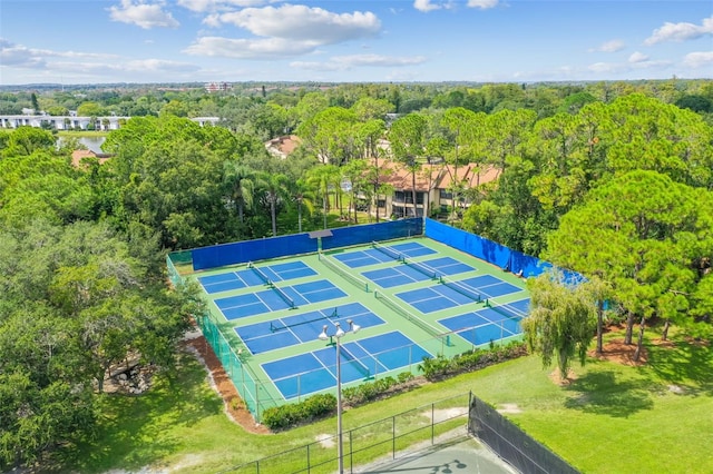 440 Woods Landing Trl, Oldsmar, FL 34677 - view of sport court featuring fence and a view of trees