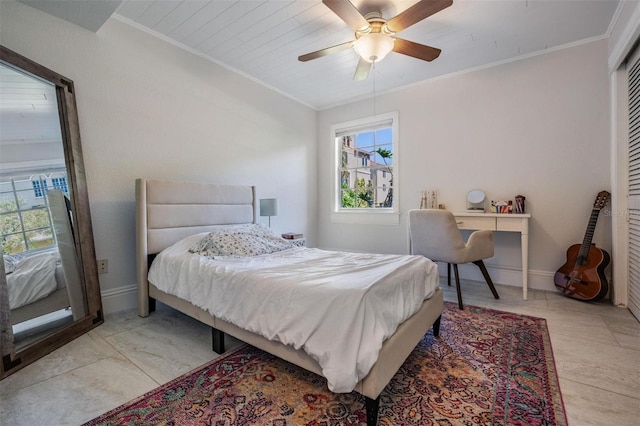 107 S Obrien St Unit 117, Tampa, FL 33609 - bedroom featuring baseboards, ornamental molding, and a ceiling fan