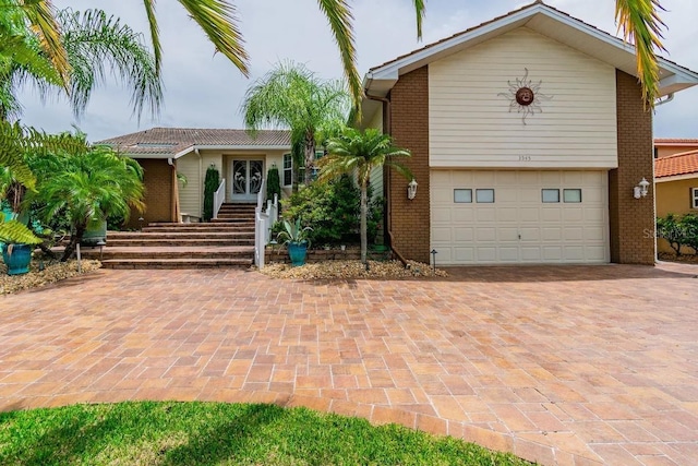 3545 Seaway Dr, New Port Richey, FL 34652 - view of front of house featuring decorative driveway and brick siding