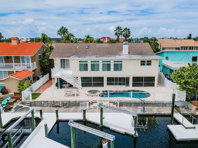 3545 Seaway Dr, New Port Richey, FL 34652 - exterior space featuring a patio, a fenced backyard, and boat lift