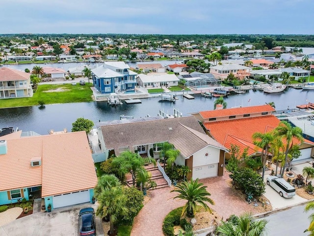3545 Seaway Dr, New Port Richey, FL 34652 - drone / aerial view featuring a residential view and a water view