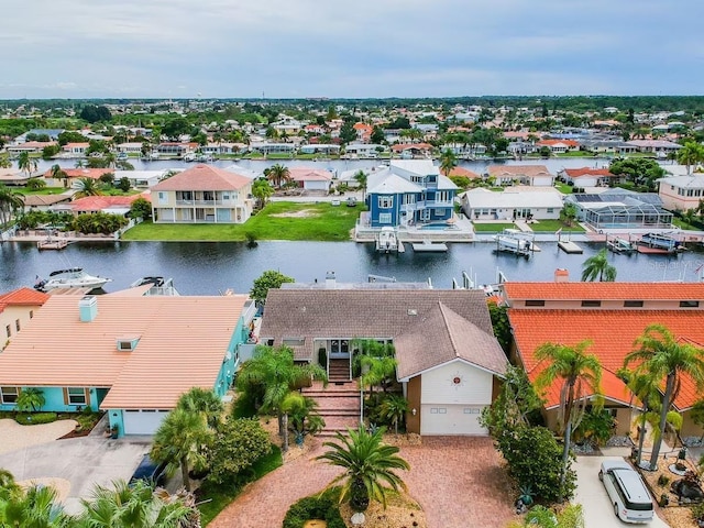 3545 Seaway Dr, New Port Richey, FL 34652 - drone / aerial view featuring a residential view and a water view