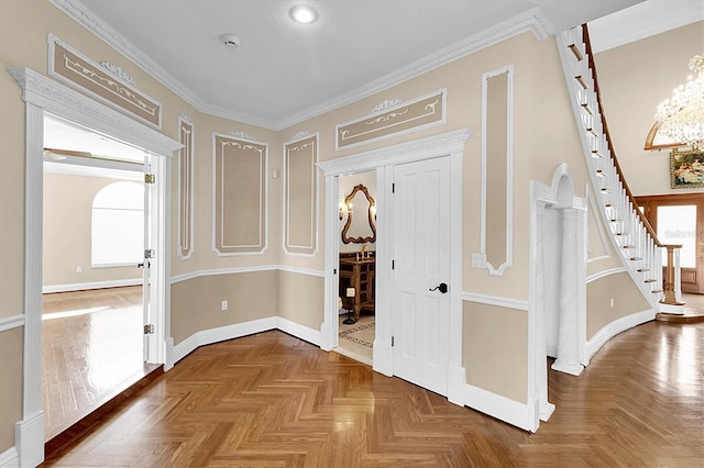 4404 Lake In The Woods Dr, Spring Hill, FL 34607 - hallway featuring baseboards, a chandelier, stairway, and crown molding