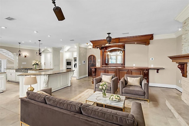 4404 Lake In The Woods Dr, Spring Hill, FL 34607 - living room featuring crown molding, baseboards, recessed lighting, arched walkways, and light tile patterned floors