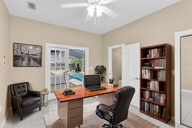 4404 Lake In The Woods Dr, Spring Hill, FL 34607 - office space with ceiling fan, light tile patterned flooring, and baseboards