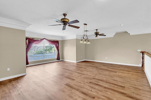 4404 Lake In The Woods Dr, Spring Hill, FL 34607 - unfurnished room featuring a ceiling fan, crown molding, baseboards, wood finished floors, and a chandelier