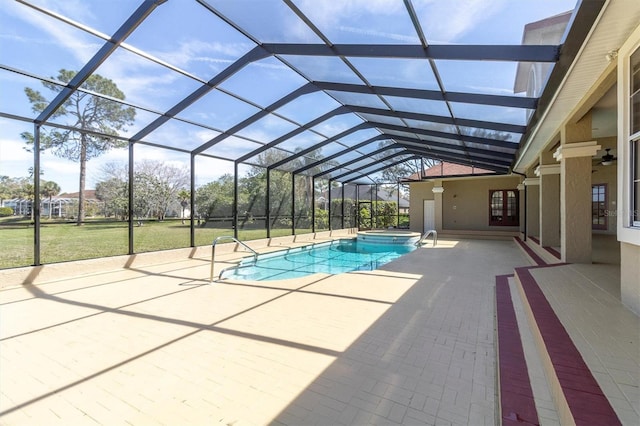 4404 Lake In The Woods Dr, Spring Hill, FL 34607 - view of pool with a patio area, a pool with connected hot tub, glass enclosure, and a yard