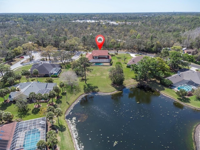 4404 Lake In The Woods Dr, Spring Hill, FL 34607 - view of property location with a forest, a nearby body of water, and nearby suburban area