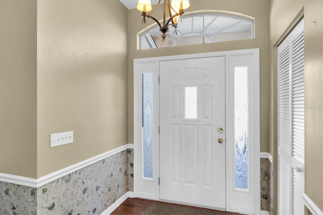 7472 Clearmeadow Dr, Spring Hill, FL 34606 - foyer with an inviting chandelier and a wealth of natural light