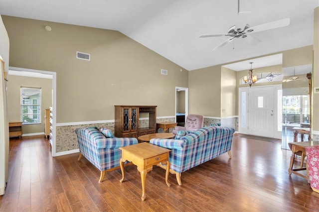 7472 Clearmeadow Dr, Spring Hill, FL 34606 - living area with visible vents, high vaulted ceiling, ceiling fan with notable chandelier, wood finished floors, and wainscoting
